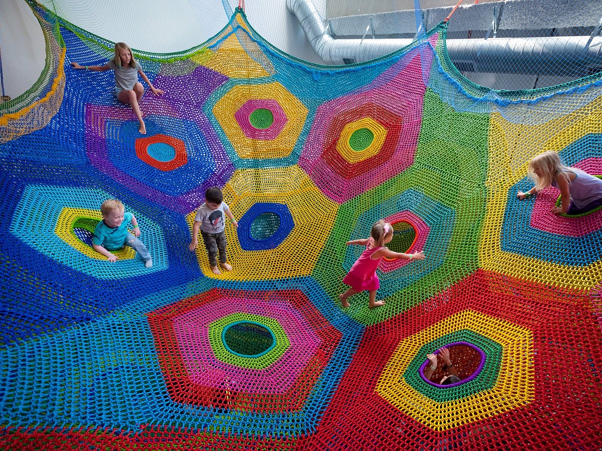 Children exploring a hands-on exhibit at a San Diego children's museum