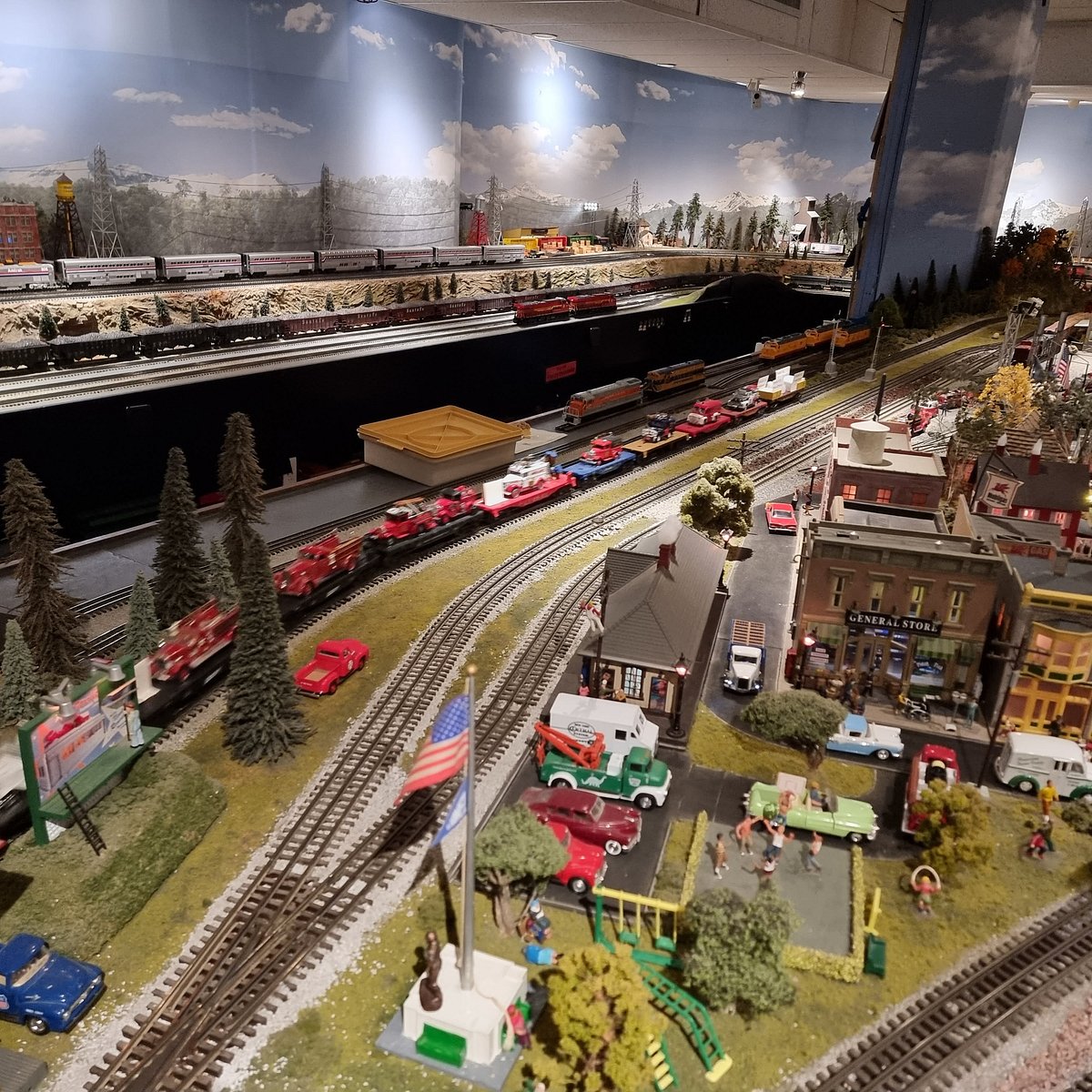 Large scenic model railroad layout depicting a Southern California mountain rail route